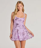 Turn heads in the beaming Pretty Elegance Tulle Lace-Up Floral Sequin Mini Dress, a stunning lavender sequin dress designed to add sparkle and elegance to your next night out or special occasion.