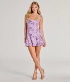 The Pretty Elegance Tulle Lace-Up Floral Sequin Mini Dress is a dazzling lavender sequin dress, perfect for making a bold entrance at any event, from cocktail parties to formal celebrations.