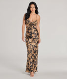 Elevate your winter wardrobe with the Gorgeous Bloom Floral Satin Maxi Dress— a party-ready black cocktail dress featuring seasonal accents and a sophisticated style, ideal for semi-formal holiday events from family dinners to NYE celebrations.