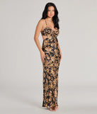 The stunning Gorgeous Bloom Floral Satin Maxi Dress provides a chic silhouette and party-ready details that make it a standout black dress for cocktail events, New Year's Eve parties, or as a winter wedding guest look.
