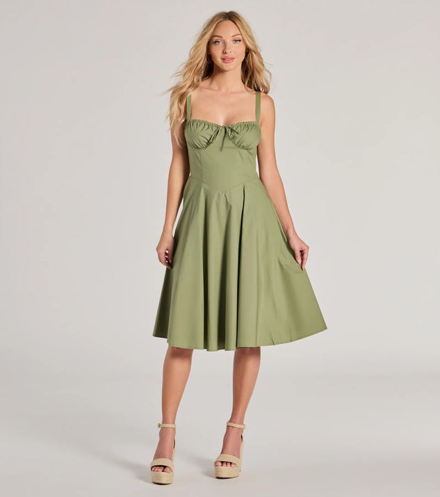 The Picturesque Cutie Corset Lace-Up A-Line Midi Dress is a sage green dress, an essential holiday or NYE dress that pairs chic style with versatility making it perfect for cocktail events, New Year's Eve parties, or as a winter wedding guest look.