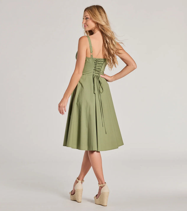 The Picturesque Cutie Corset Lace-Up A-Line Midi Dress is a sage green dress, an essential holiday or NYE dress that pairs chic style with versatility making it perfect for cocktail events, New Year's Eve parties, or as a winter wedding guest look.