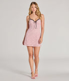 The Ray Of Romance A-Line Lace Mini Dress is a stunning pink mini dress with a short hem, designed to be the perfect winter cocktail dress or night-out look for the holiday season.