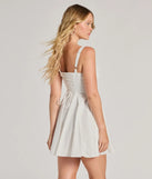 The Ray Of Beauty Lace-Up Corset Skater Dress is a mini dress in white, perfect for an above-the-knee holiday party dress or a stylish NYE look, with a short hemline designed to make a winter statement.
