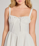 Step into winter chic with the Ray Of Beauty Lace-Up Corset Skater Dress, a white mini dress featuring an above-the-knee cut ideal for cocktail parties, festive gatherings, or clubwear.