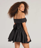 The Luxe Moment Drop Waist Skater Dress is a mini dress in black, perfect for an above-the-knee holiday party dress or a stylish NYE look, with a short hemline designed to make a winter statement.