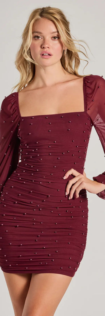 Step into seasonal chic with the Lovely Vibe Pearl Mesh Long Sleeve Mini Dress, a wine mini dress featuring an above-the-knee cut ideal for cocktail parties, festive gatherings, or clubwear.