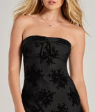 The Stylish Flair Floral Velvet Burnout Ruffled Mini Dress in black combines chic design and festive charm, offering a cocktail dress perfect for winter cocktail parties, work events, and holiday soirées.
