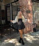 The stunning Pretty Vibes Polka Dot Drop Waist Skater Dress provides a chic silhouette and party-ready details that make it a standout black dress for cocktail events, New Year's Eve parties, or as a winter wedding guest look.