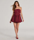 The Adorably Flirty Lace Trim Drop Waist Skater Dress is a stunning wine mini dress with a short hem, designed to be the perfect winter cocktail dress or night-out look for the holiday season.