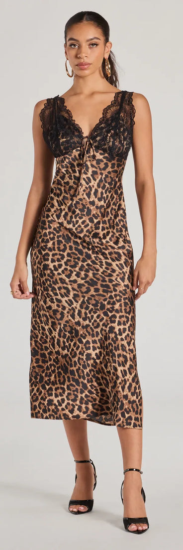 Feel instantly put-together in the Sleek Leopard Print Lace And Satin Midi Dress in brown, a summer wedding guest dress designed for confident style and all-out celebration.