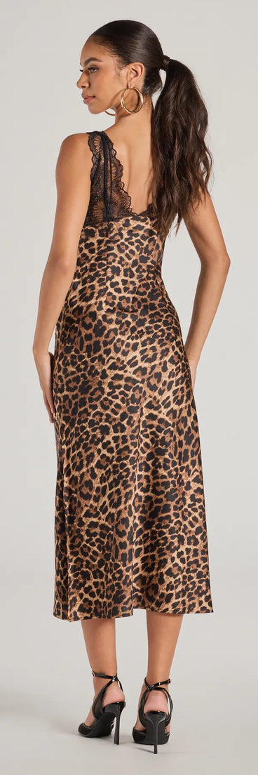 Own the evening in the Sleek Leopard Print Lace And Satin Midi Dress in brown, a summer cocktail dress perfect for rooftop parties and stylish soirées.