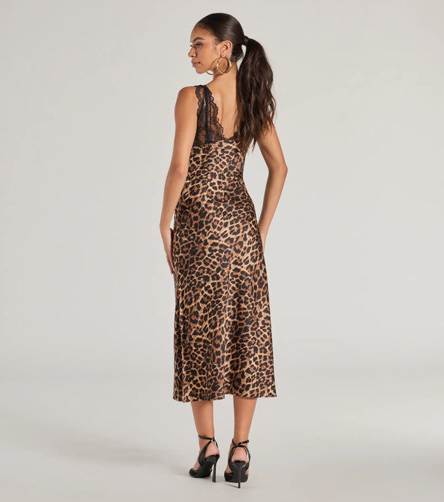 Turn heads with the Sleek Leopard Print Lace And Satin Midi Dress, a brown New Year's Eve dress featuring a festive style and glamorous accents, ideal for any NYE celebration or cocktail party.