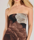 The Grandeur Blooms Strapless Slit Floral Maxi Dress is an essential holiday or NYE dress that pairs chic style with versatility making it perfect for cocktail events, New Year's Eve parties, or as a winter wedding guest look.