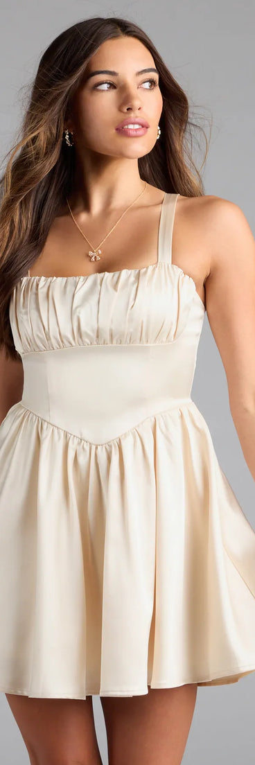 The Crowd Pleaser Satin Skater Dress is your new go-to ivory dress—effortless, versatile, and made to update your fall style in seconds.