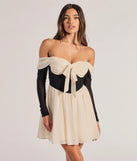 The Perfectly Chic Bow Detail Off-The-Shoulder Skater Dress is a ivory dress, an essential holiday or NYE dress that pairs chic style with versatility making it perfect for cocktail events, New Year's Eve parties, or as a winter wedding guest look.