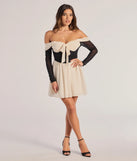 The Perfectly Chic Bow Detail Off-The-Shoulder Skater Dress is a ivory dress, an essential holiday or NYE dress that pairs chic style with versatility making it perfect for cocktail events, New Year's Eve parties, or as a winter wedding guest look.