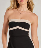 The stunning Adorable Stunner Strapless A-Line Mini Dress provides a chic silhouette and party-ready details that make it a standout black dress for cocktail events, New Year's Eve parties, or as a winter wedding guest look.