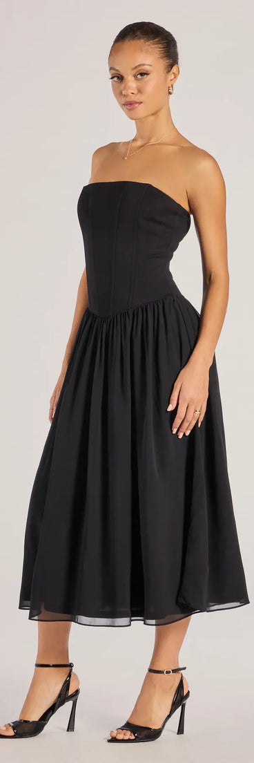 Celebrate the special day in the Stylish Moment Drop Waist A-Line Midi Dress, a black country wedding guest dress with soft, romantic details that blend charm and sophistication.
