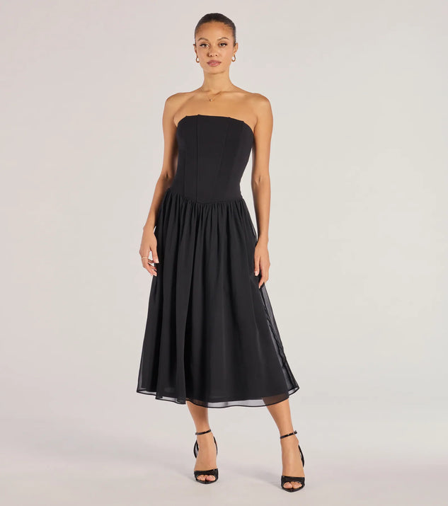 The Stylish Moment Drop Waist A-Line Midi Dress in black combines chic design and festive charm, offering a cocktail dress perfect for winter cocktail parties, work events, and holiday soirées.