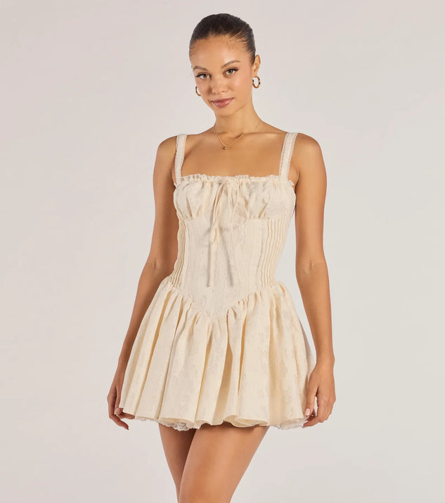The Flirt It Up Floral Jacquard Satin Corset Skater Dress is a ivory dress, an essential holiday or NYE dress that pairs chic style with versatility making it perfect for cocktail events, New Year's Eve parties, or as a winter wedding guest look.