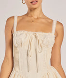 The Flirt It Up Floral Jacquard Satin Corset Skater Dress is a ivory dress, an essential holiday or NYE dress that pairs chic style with versatility making it perfect for cocktail events, New Year's Eve parties, or as a winter wedding guest look.