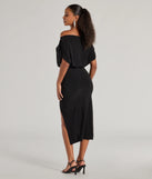 The Stop And Stun Off-The-Shoulder Midi Dress in black combines chic design and festive charm, offering a cocktail dress perfect for winter cocktail parties, work events, and holiday soirées.