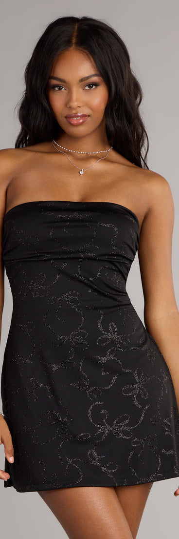 The Subtle Spark Glitter Bow Mini Dress is your new go-to Windsor dress—effortless, versatile, and made to update your fall style in seconds.