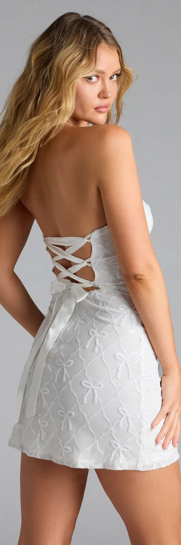 Own the evening in the Cutest Style Sequin Bow Strapless Lace-Up Mini Dress in white, a fall cocktail dress perfect for rooftop parties and stylish soirées.