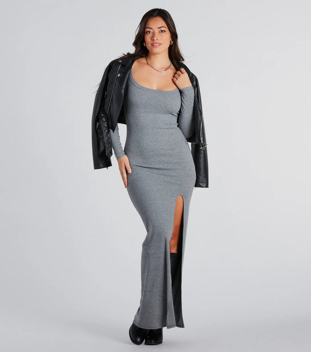 The Elevated Vibes Ribbed Knit High Slit Maxi Dress is a cozy sweater dress made from soft, stretchy fabric, perfect for layering on chilly winter days or dressing up as a warm holiday dress.