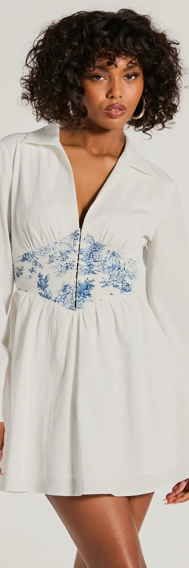 Step into winter chic with the Delightful View Collared Scenic Waist Skater Dress, a white mini dress featuring an above-the-knee cut ideal for cocktail parties, festive gatherings, or clubwear.