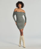 The Flawless Style Knit Off-The-Shoulder Long Sleeve Mini Dress is a olive dress, an essential holiday or NYE dress that pairs chic style with versatility making it perfect for cocktail events, New Year's Eve parties, or as a winter wedding guest look.