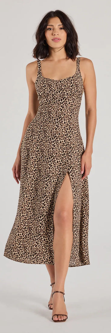 Revamp your 2025 wardrobe with this chic addition, the Elevated Leopard Print Woven A-Line Midi Dress in brown, perfect for elevating your style in the new year.