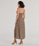 The Elevated Leopard Print Woven A-Line Midi Dress is a brown dress, an essential holiday or NYE dress that pairs chic style with versatility making it perfect for cocktail events, New Year's Eve parties, or as a winter wedding guest look.