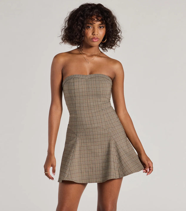The Adorable Look Plaid Print Strapless Skater Dress is a taupe dress, an essential holiday or NYE dress that pairs chic style with versatility making it perfect for cocktail events, New Year's Eve parties, or as a winter wedding guest look.