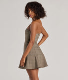 The Adorable Look Plaid Print Strapless Skater Dress is a taupe dress, an essential holiday or NYE dress that pairs chic style with versatility making it perfect for cocktail events, New Year's Eve parties, or as a winter wedding guest look.