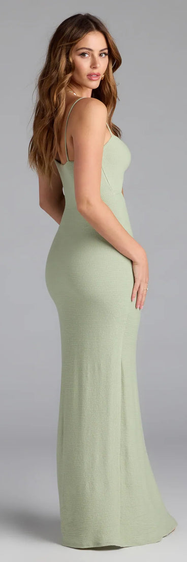 Soak up the season in the Vacay Mode Buckle Cutout Slit Maxi Dress, a sage green sundress styled for easy days, outdoor plans, and everything in between.