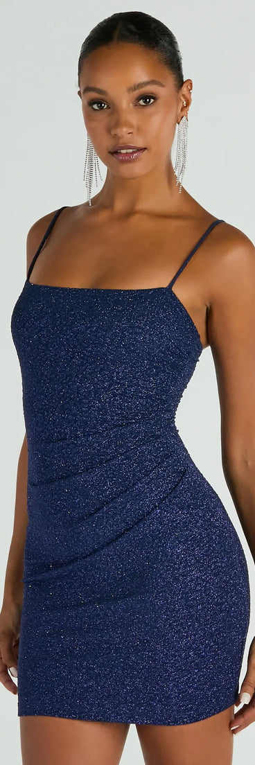 Feel ready for every dance floor moment or feed-worthy reel in the Key To Sparkle Glitter Mini Dress, a navy blue homecoming dress designed to own your moment.