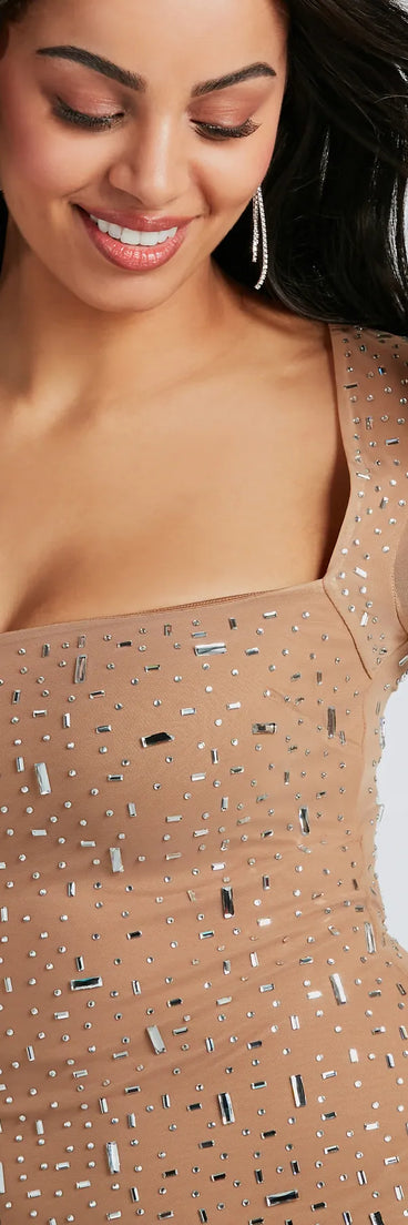 Shine with confidence, elegance, and standout style in the Dazzling Glam Long Sleeve Rhinestone Mesh Mini Dress—a nude homecoming dress designed with a fresh silhouette and the latest trends.