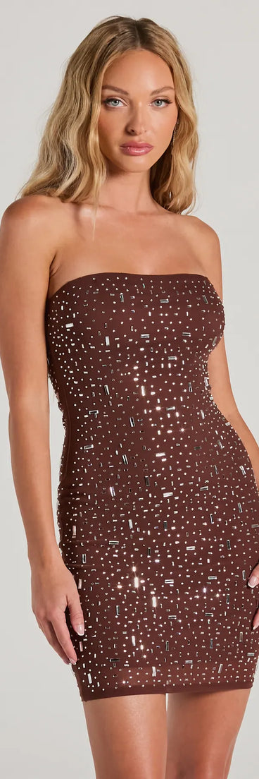 The Dazzle Babe Rhinestone Strapless Bodycon Mini Dress is a mini dress that will make a statement with its short hemline and on-trend details to have you ready for any event!