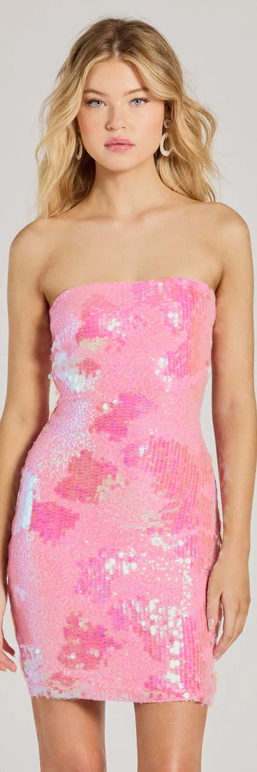 Turn heads in the beaming Sparkling Cutie Strapless Bodycon Sequin Mini Dress, a stunning pink sequin dress designed to add sparkle and elegance to your next night out or special occasion.