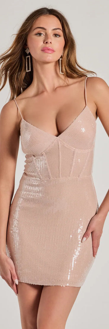 Step into seasonal chic with the Iconic Energy Sequin Mini Corset Dress, a sea foam mini dress featuring an above-the-knee cut ideal for cocktail parties, festive gatherings, or clubwear.