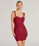 The Here To Stun Lace Trim Bodycon Mini Dress is a burgundy holiday dress with a festive style, crafted from luxe fabrics and with unique design accents, a perfect pick as your holiday party dress.