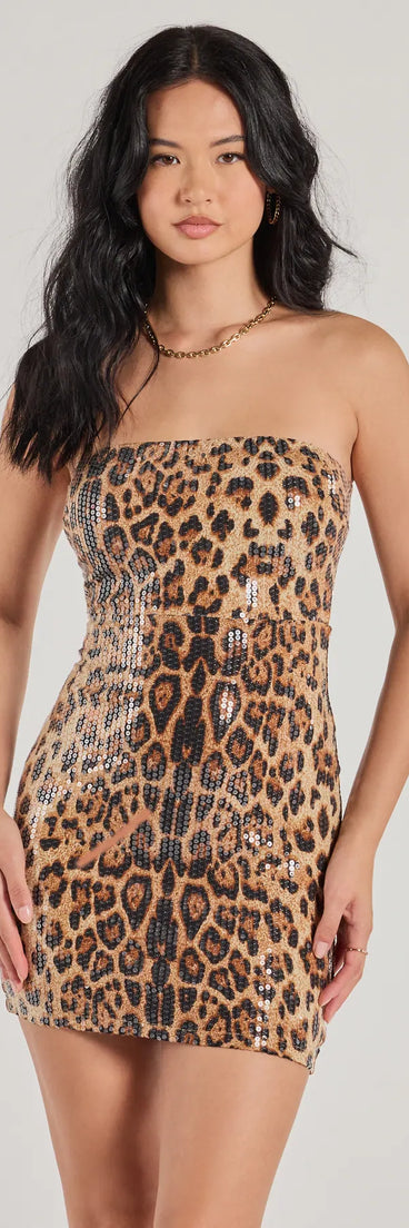 Turn heads in the beaming Wild Style Sequin Leopard Print Bodycon Mini Dress, a stunning brown sequin dress designed to add sparkle and elegance to your next night out or special occasion.