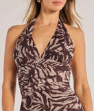 Make a statement in the Fierce Style Zebra Print Mesh Halter Mini Dress, a brown bodycon dresses that blends unique design details with a tight silhouette for a head-turning holiday or New Year's eve dress.