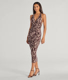 The Fierce Style Zebra Print Mesh Halter Midi Dress in brown combines chic design and festive charm, offering a cocktail dress perfect for winter cocktail parties, work events, and holiday soirées.