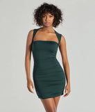 The Curves Ahead Ruched Mini Dress is a hunter green dress, an essential holiday or NYE dress that pairs chic style with versatility making it perfect for cocktail events, New Year's Eve parties, or as a winter wedding guest look.