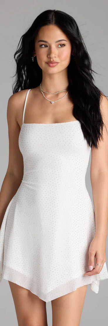 Shine with confidence, elegance, and standout style in the Sparkling Perfection Rhinestone A-Line Mini Dress—a white homecoming dress designed with a fresh silhouette and the latest trends.