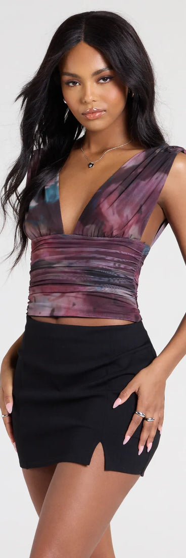 Complete your look with the Artful Impression Sleeveless Abstract Print Crop Top, a trendy multi-color top that’s ready to pair with anything in your fall rotation.