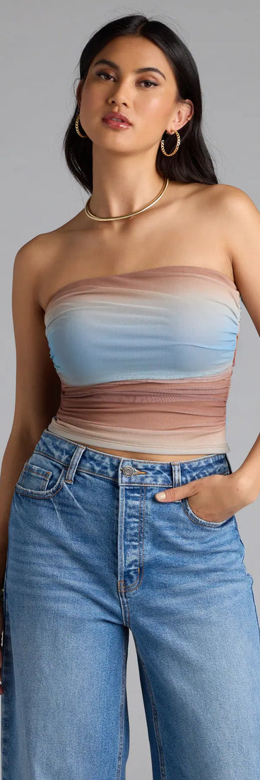 Complete your look with the Artsy Allure Abstract Print Mesh Tube Top, a trendy multi-color top that’s ready to pair with anything in your fall rotation.